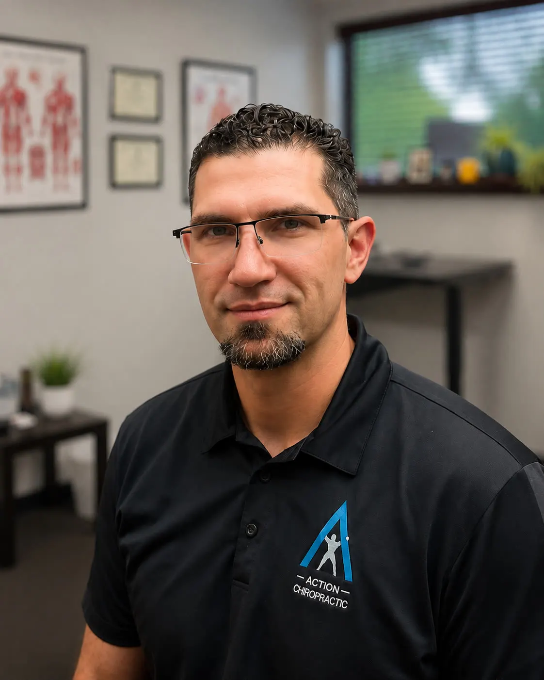 Dr. Jason Durnas, D.C., DACBSP, in his consulting room