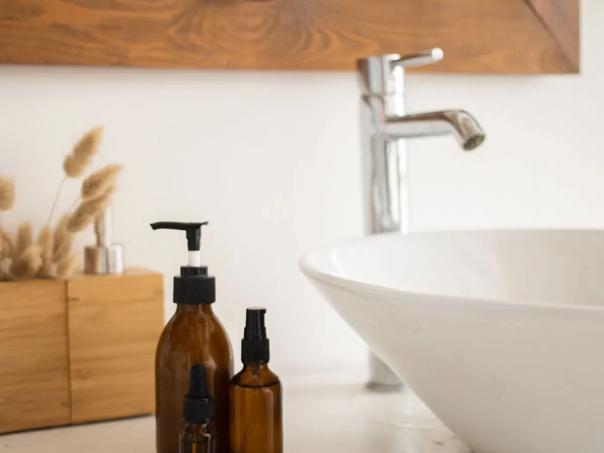 A clean vanity and washbasin with fresh towels