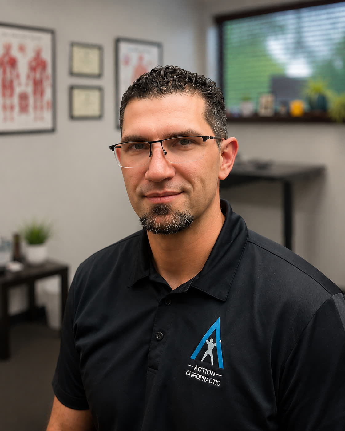 Dr. Jason Durnas, D.C., DACBSP, in his consulting room